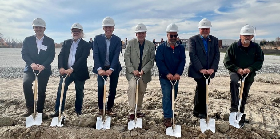 group of people with hard hats and shovels