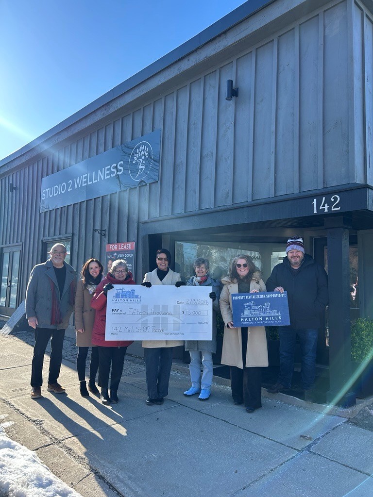 A photo of the Cheque Presentation for 142 Mill Street