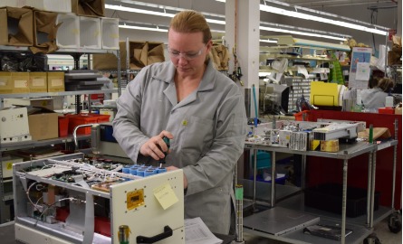 Woman working on machine